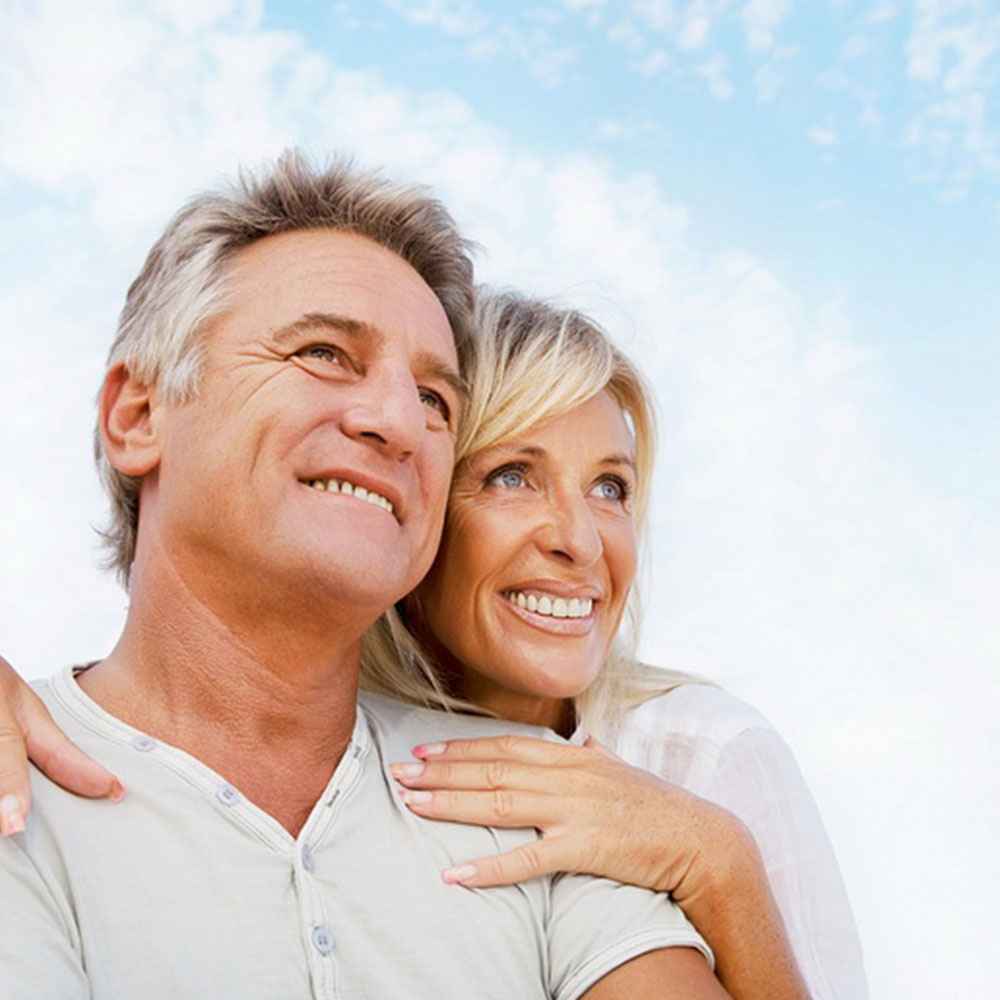 Portrait of happy couple | Hormone Therapy | Resurgence Wellness in Arlington, TX